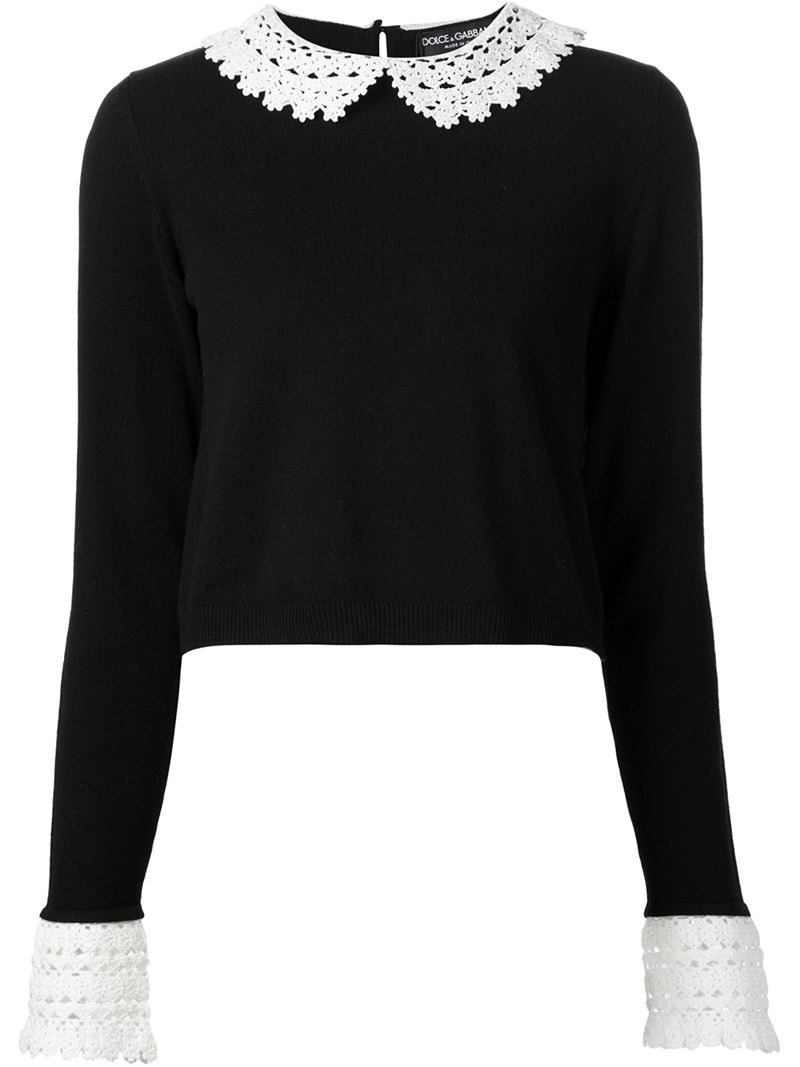 black sweater with white collar