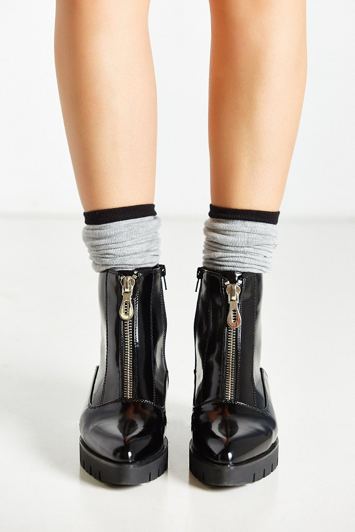 black patent zip front boots