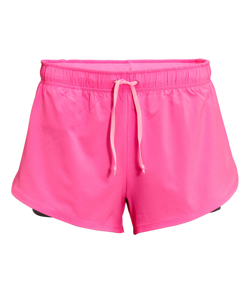 Спортивные шорты h&m. Розовый неоновый шорты 90-е синтетика. Розовые Неоновые шорты с ремнем 90-е синтетика.