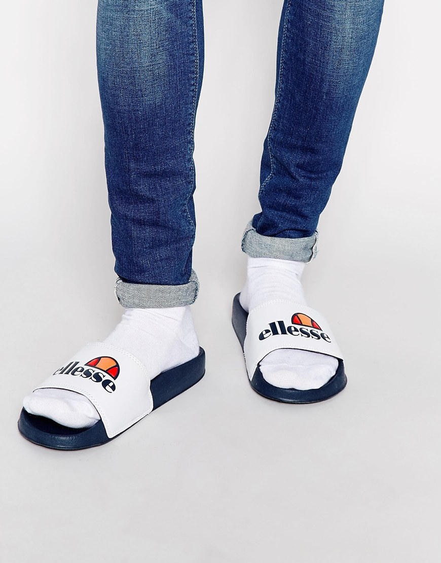 white ellesse sliders