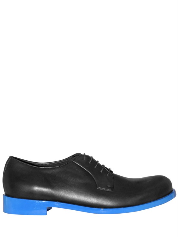 dress shoes with blue soles