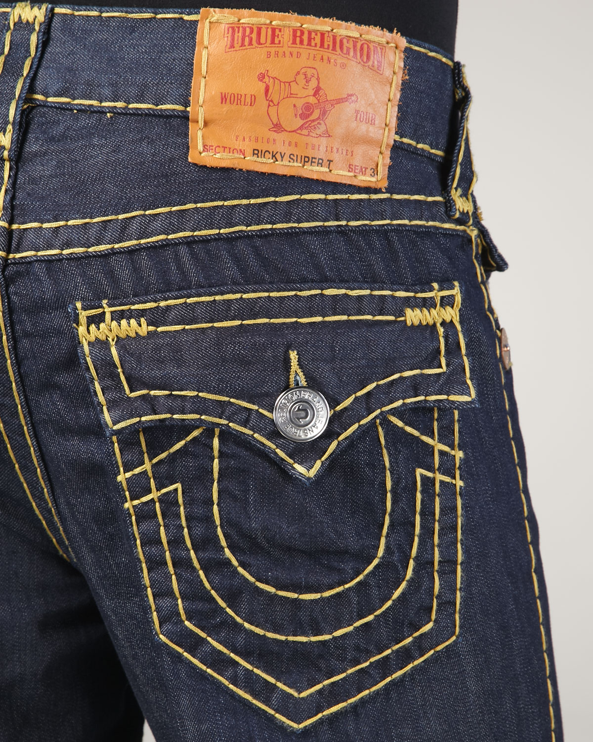 black and yellow true religion jeans