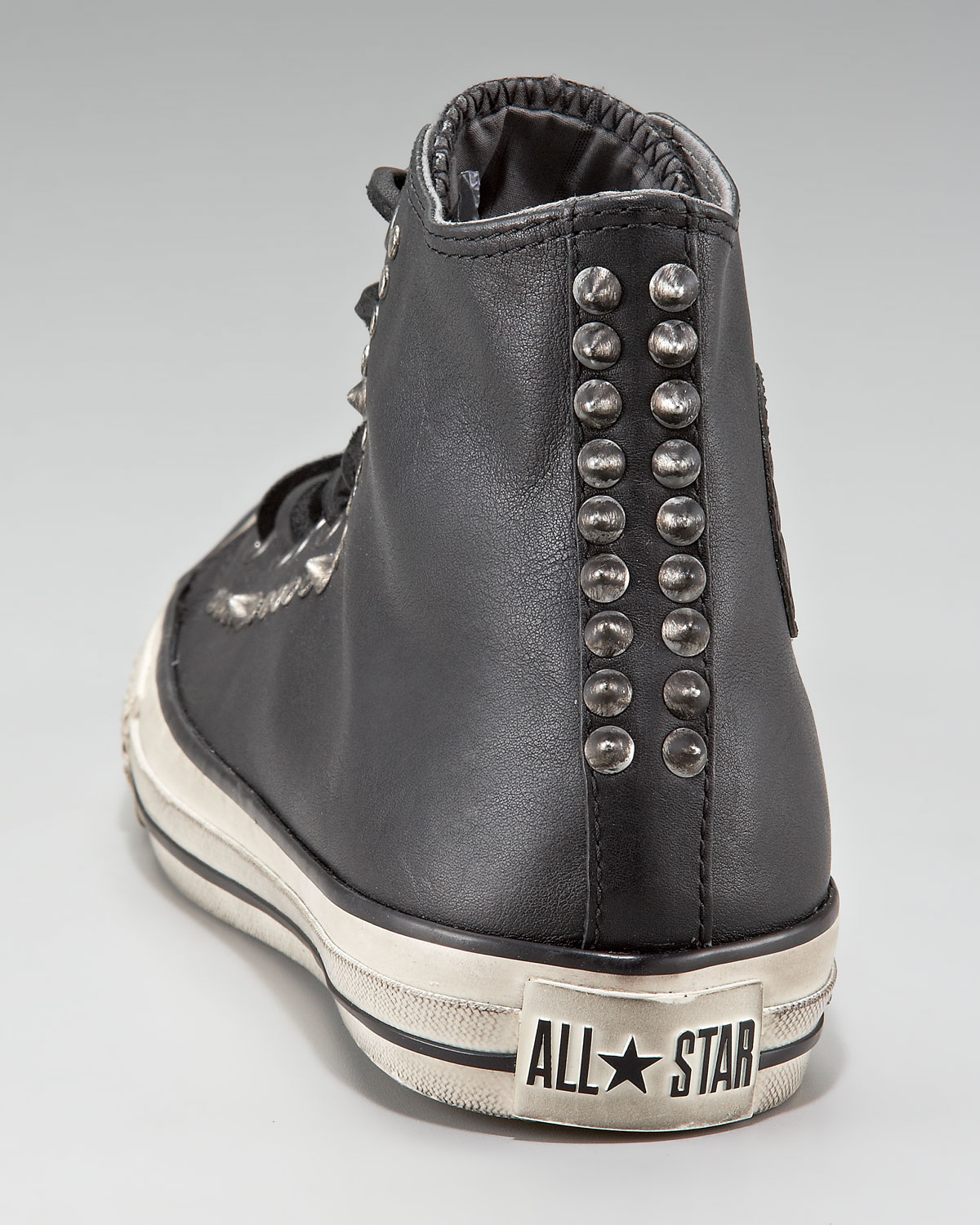 black stud converse