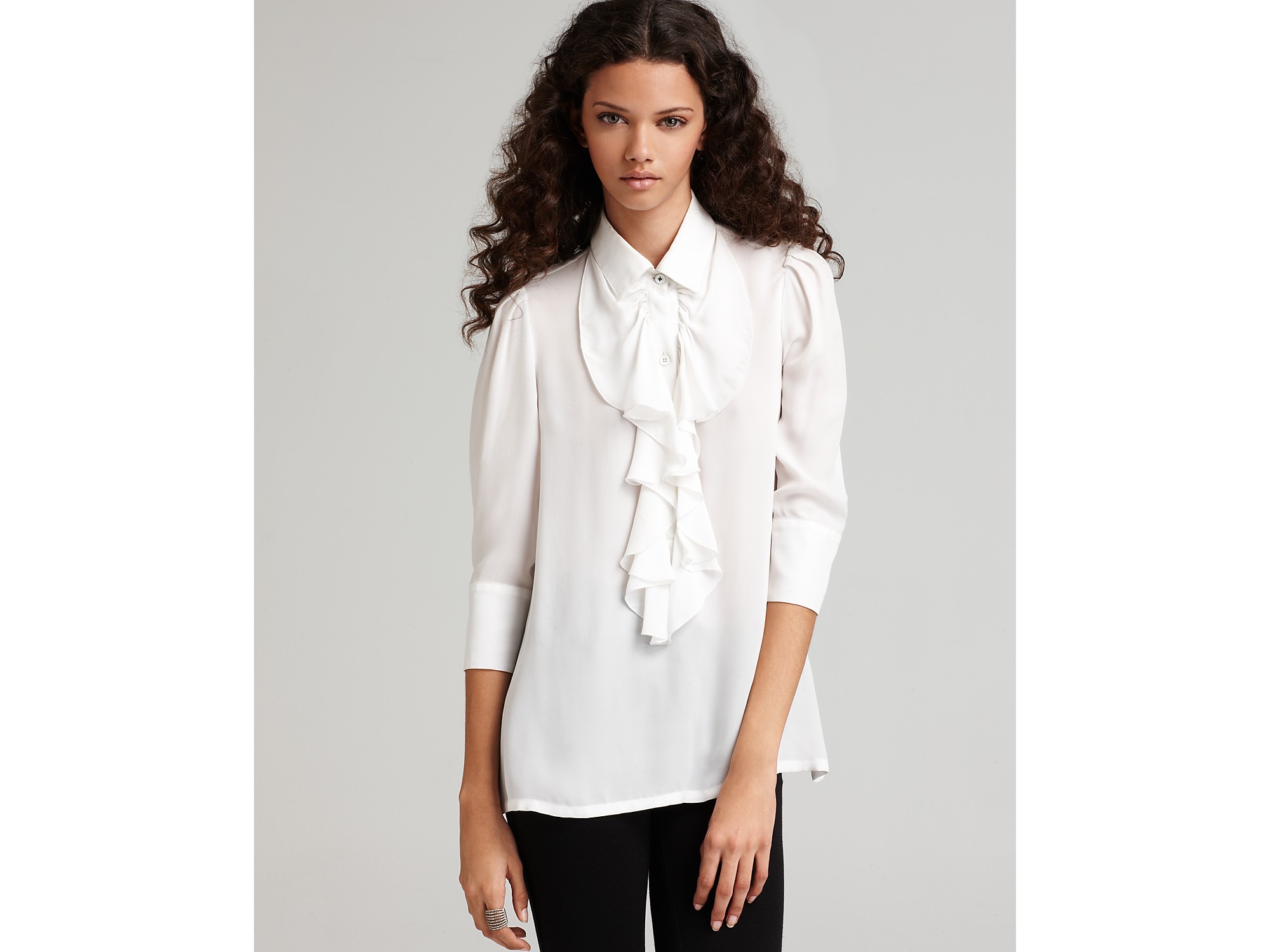 white blouse with ruffles in front