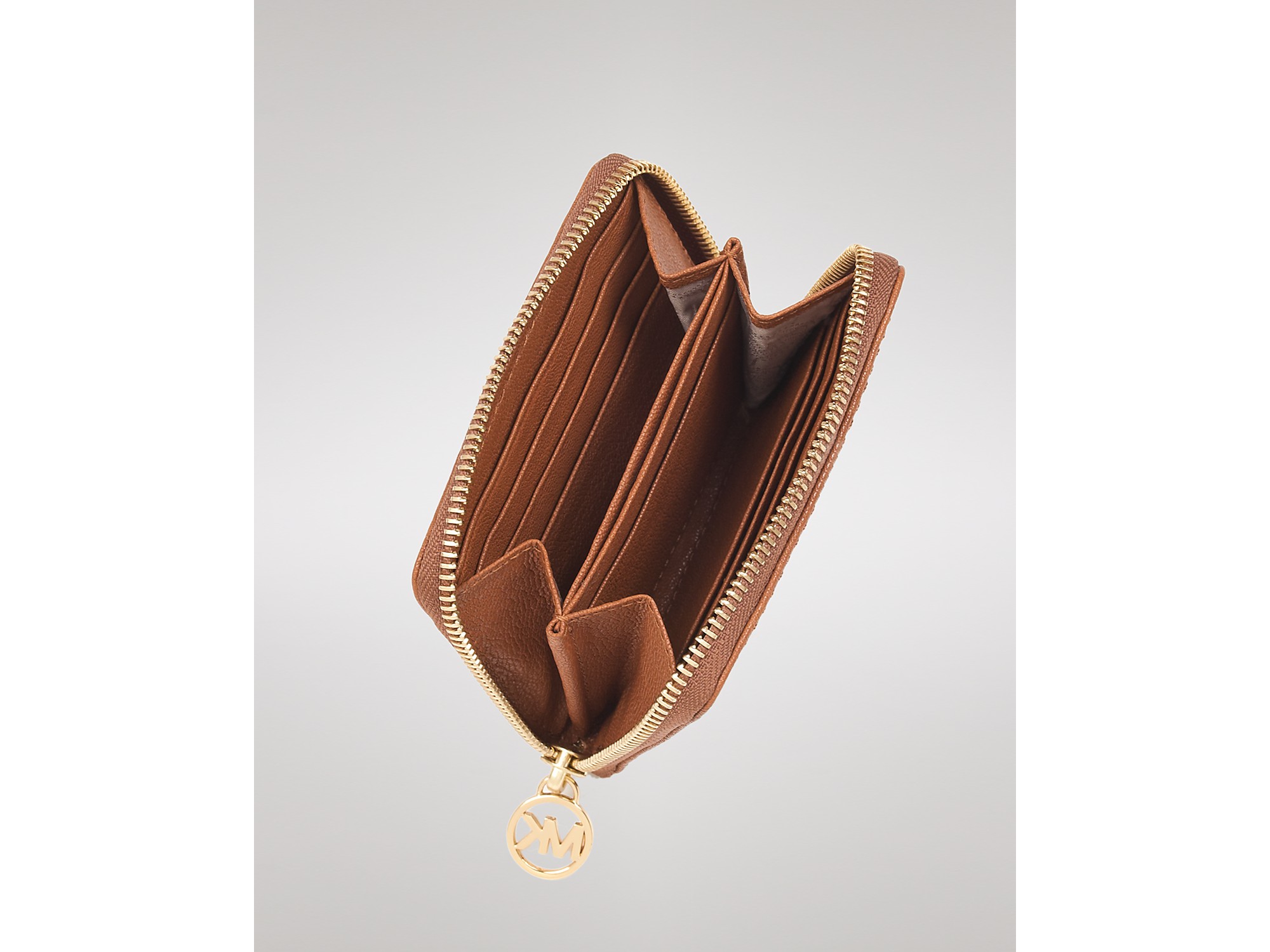 Michael Kors Michael Jet Set Small Zip Around Wallet in Bronze (Brown) - Lyst