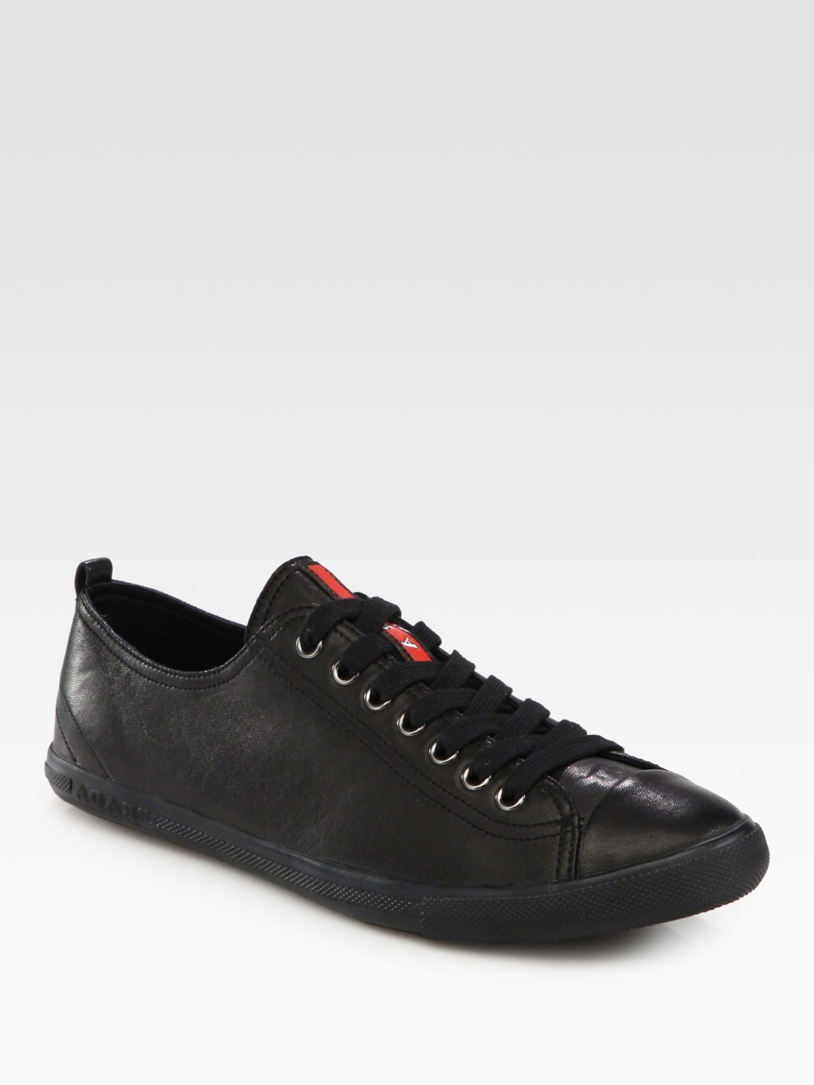 Classic Caps: Prada Cap Toe Leather Sneakers