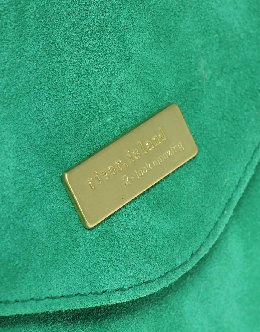 green suede clutch bag