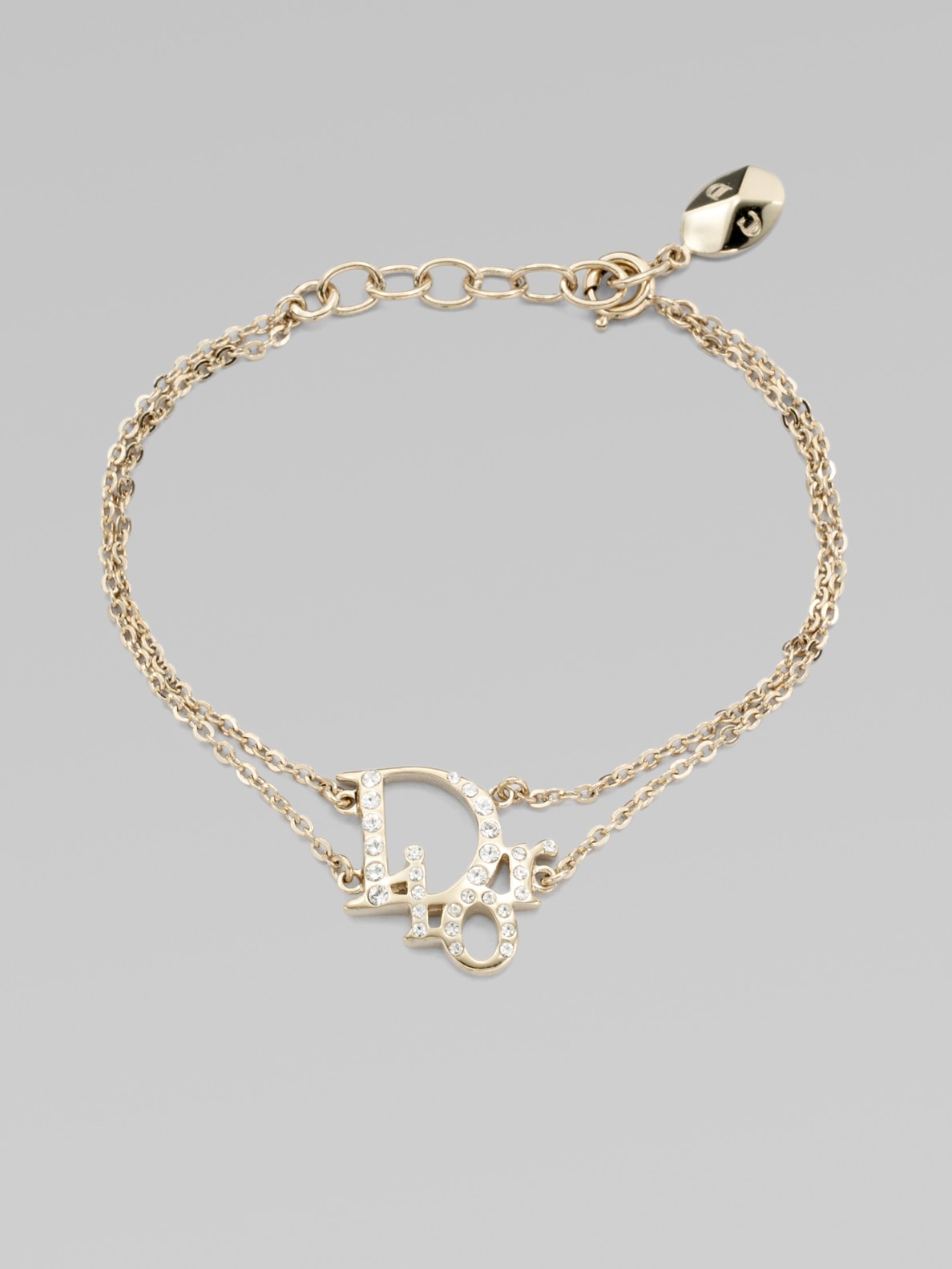 Dior Crystal Accented Signature Logo Bracelet in Metallic | Lyst