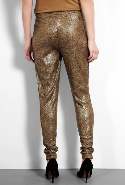 Shop my Instagram Harem Pants with Shiny Sequin Dot Panels - BLACK / GOLD-These dazzling harem pants are a great base for any belly dance or harem genie costume! Chiffon base pants with strips of sparkle dot material, elastic waistband and ankles, and a lining panel s.