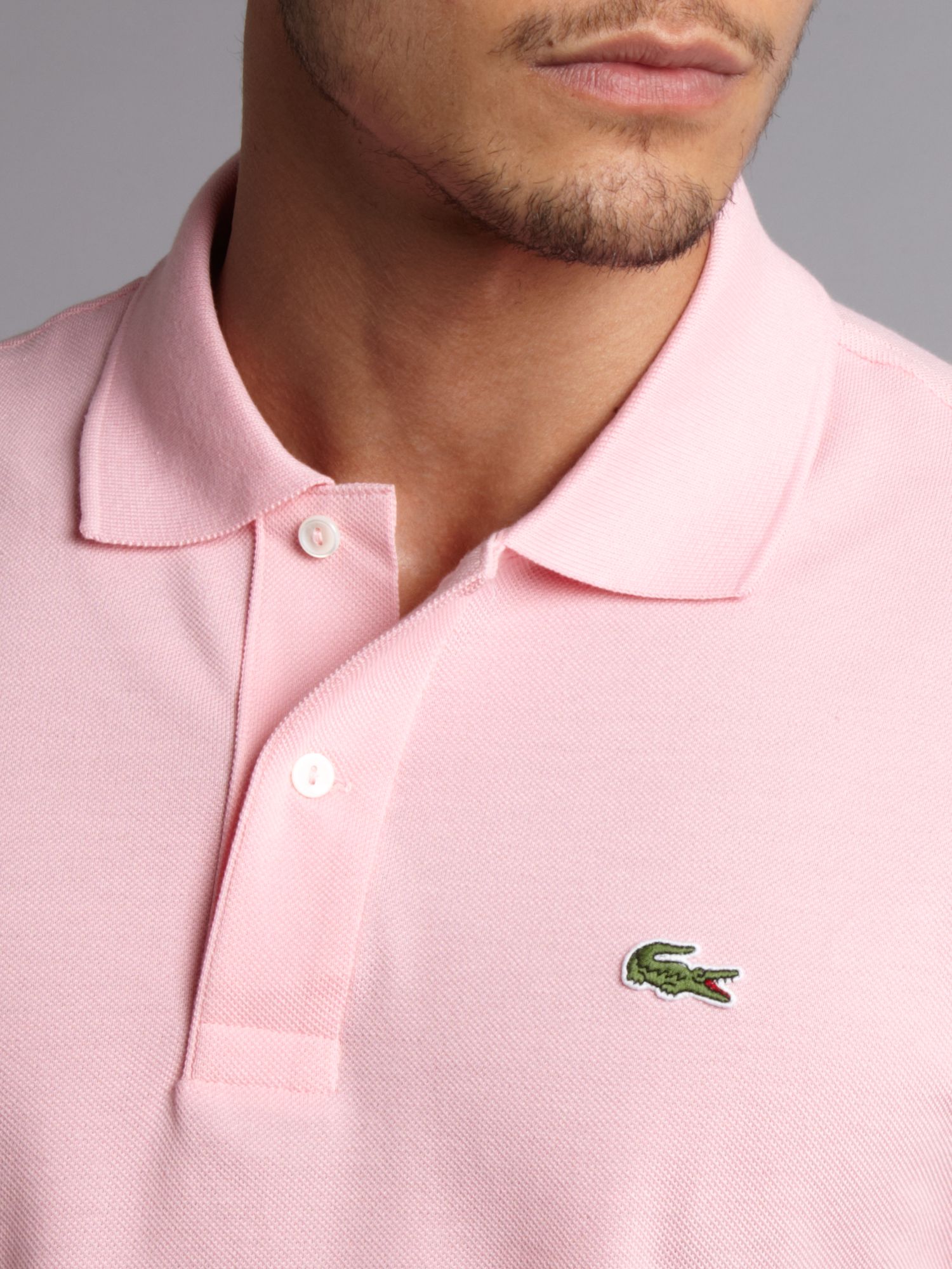 pink lacoste shirt