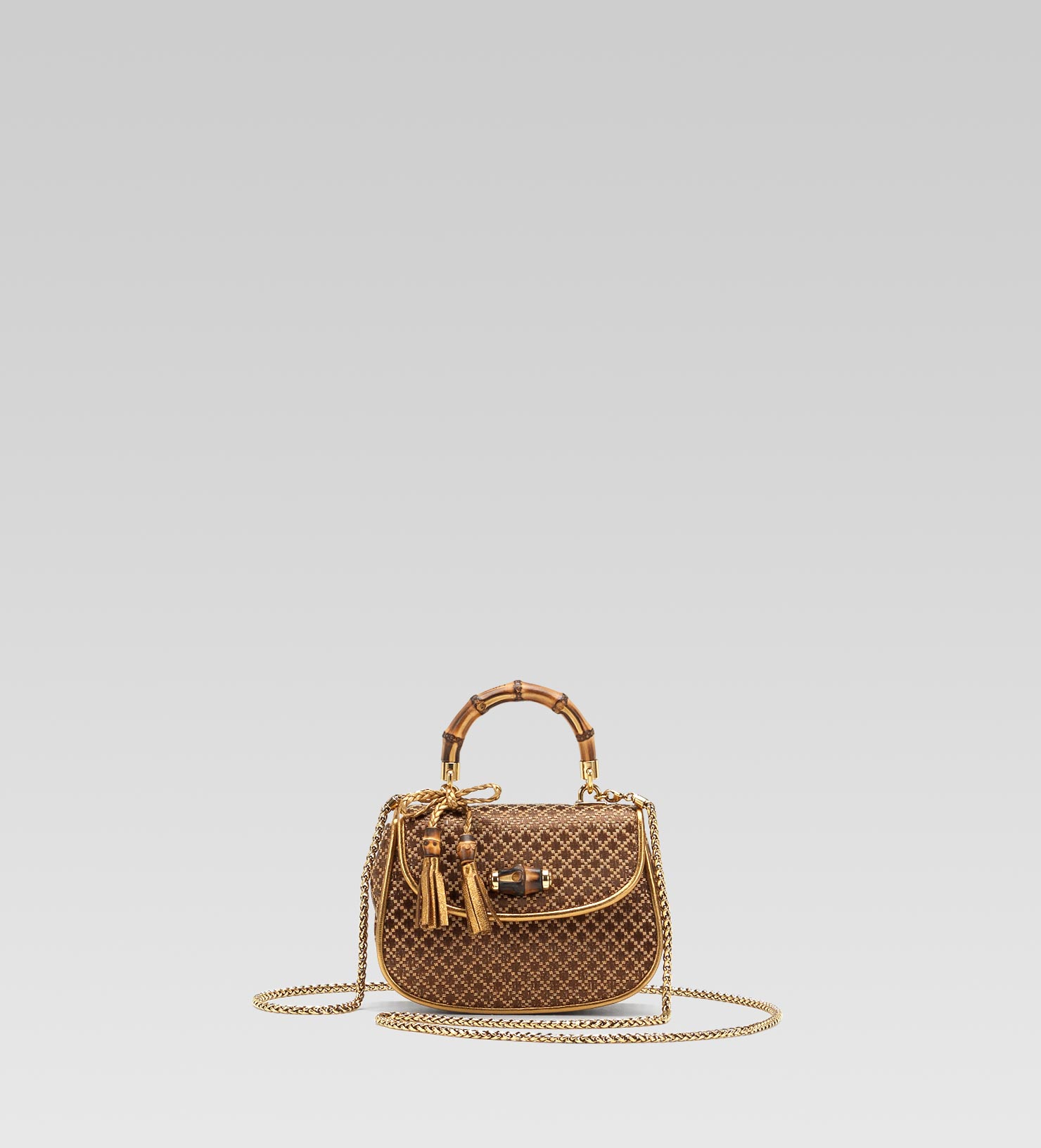 gucci bamboo tassel clutch
