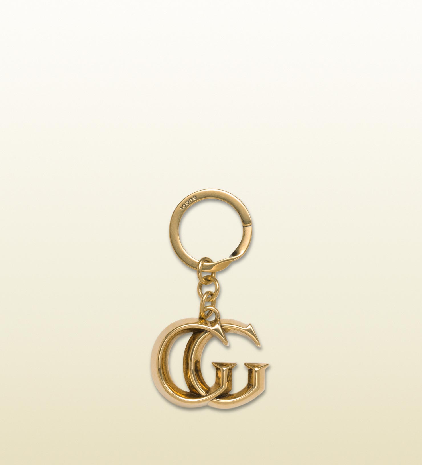gold gucci keychain
