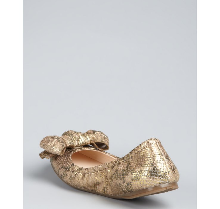 gold prada flats