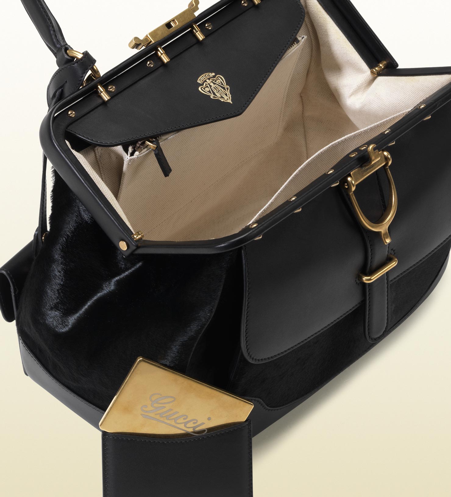 gucci stirrup top handle bag