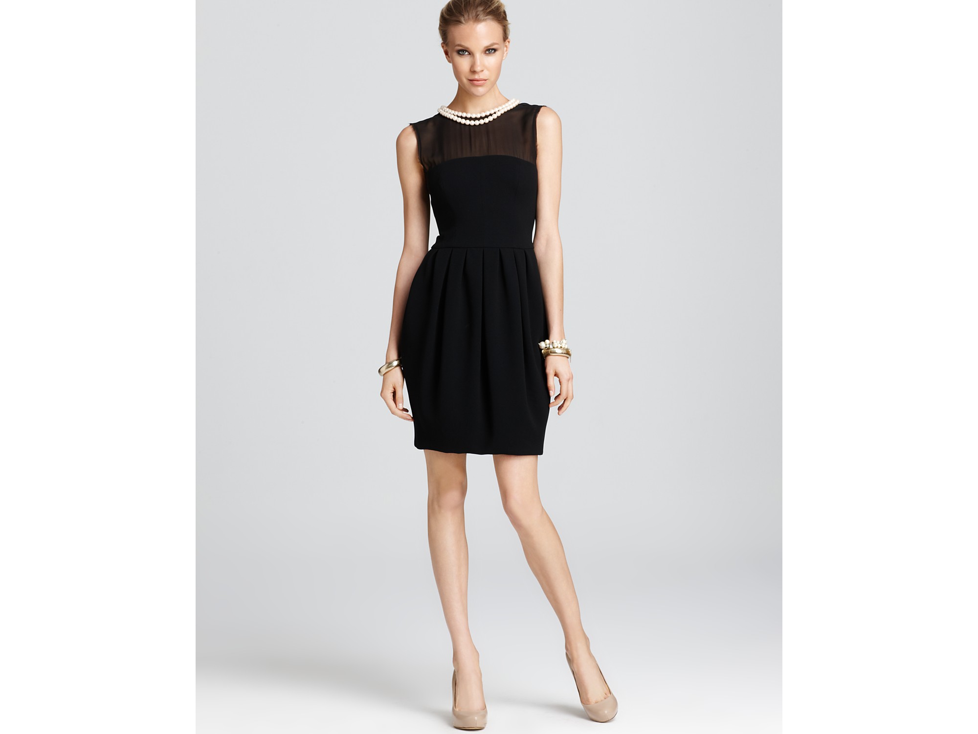 black dress with pearl collar