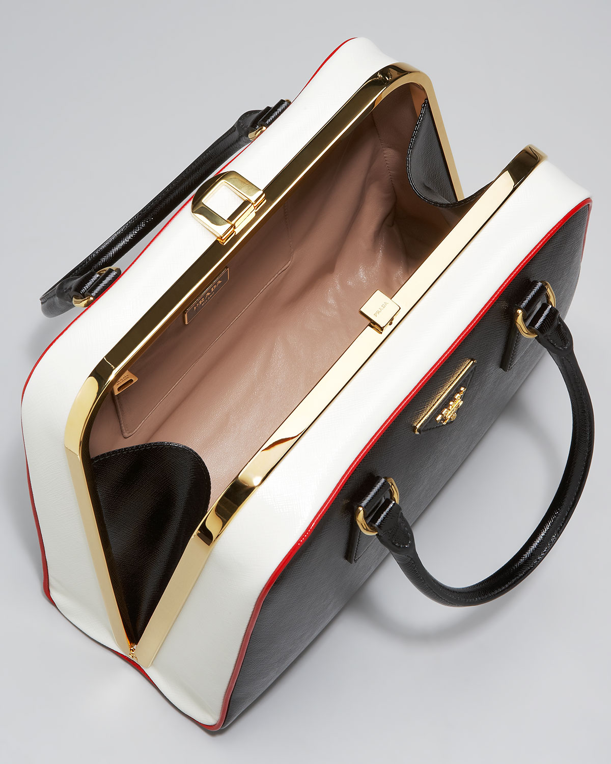 prada pyramid frame bag