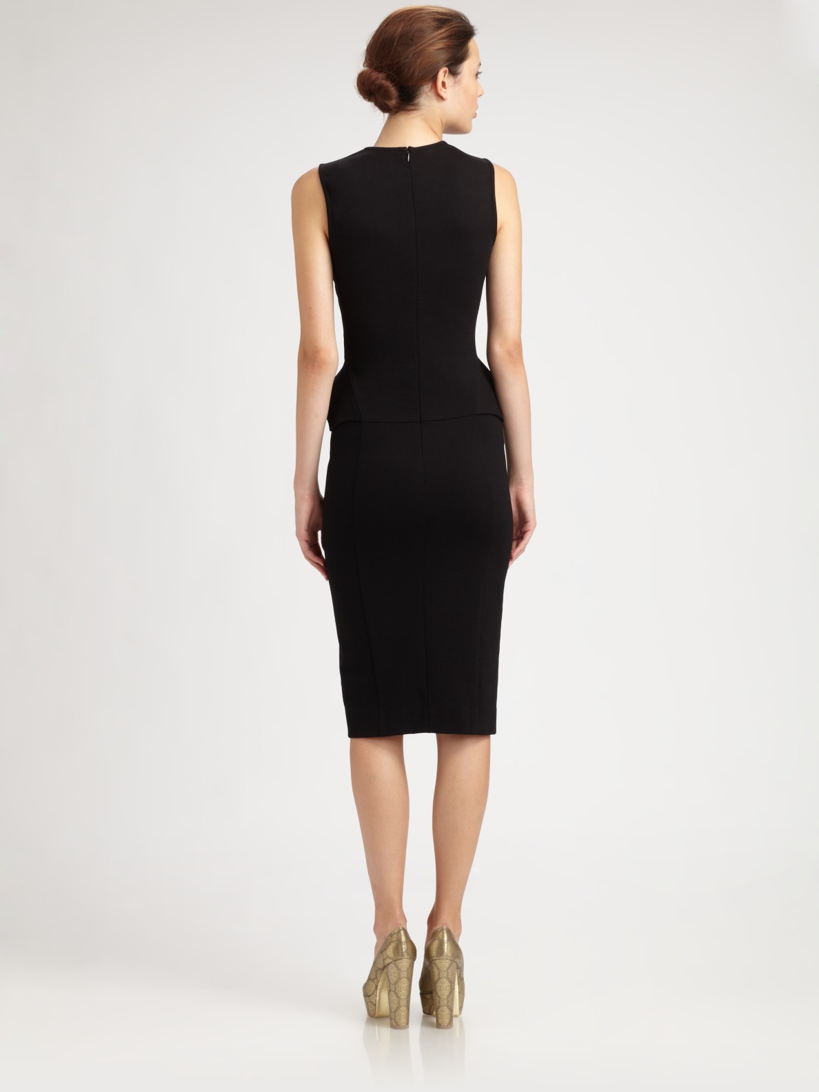 black sleeveless peplum dress