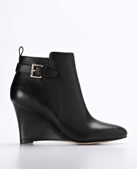 Ann Taylor Carter Buckle Leather Wedge Booties in Black | Lyst
