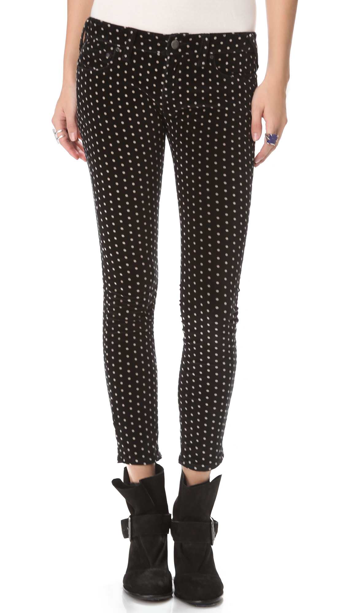 white pants with black polka dots
