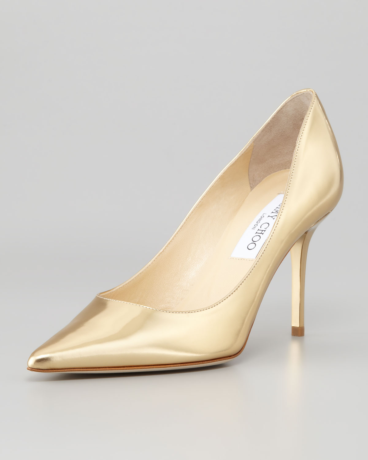 pointed toe gold pumps