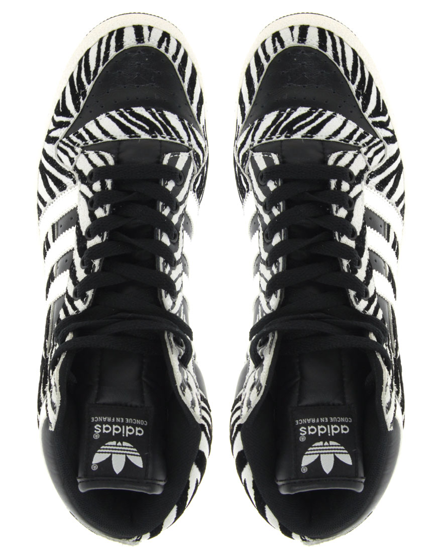 black trainers with animal print
