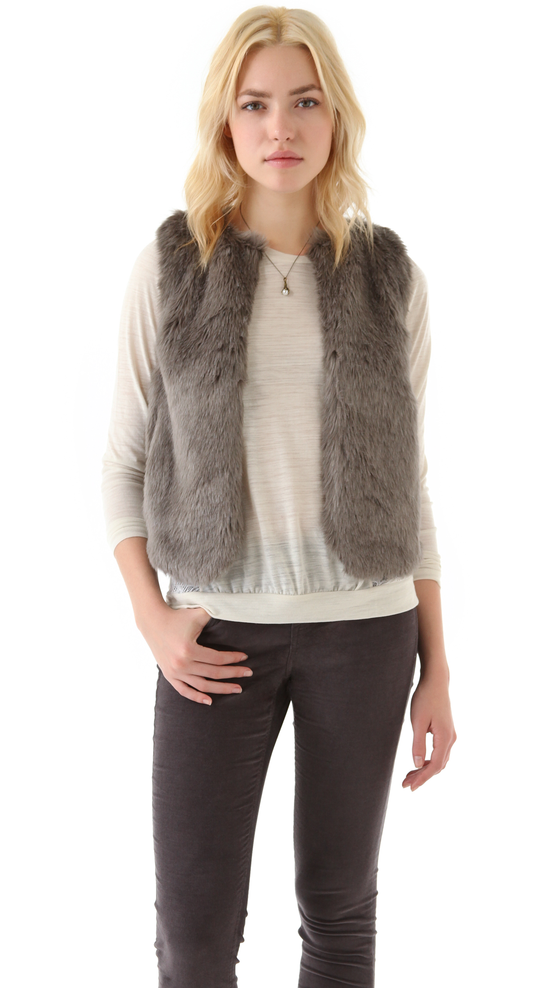 gray fuzzy vest