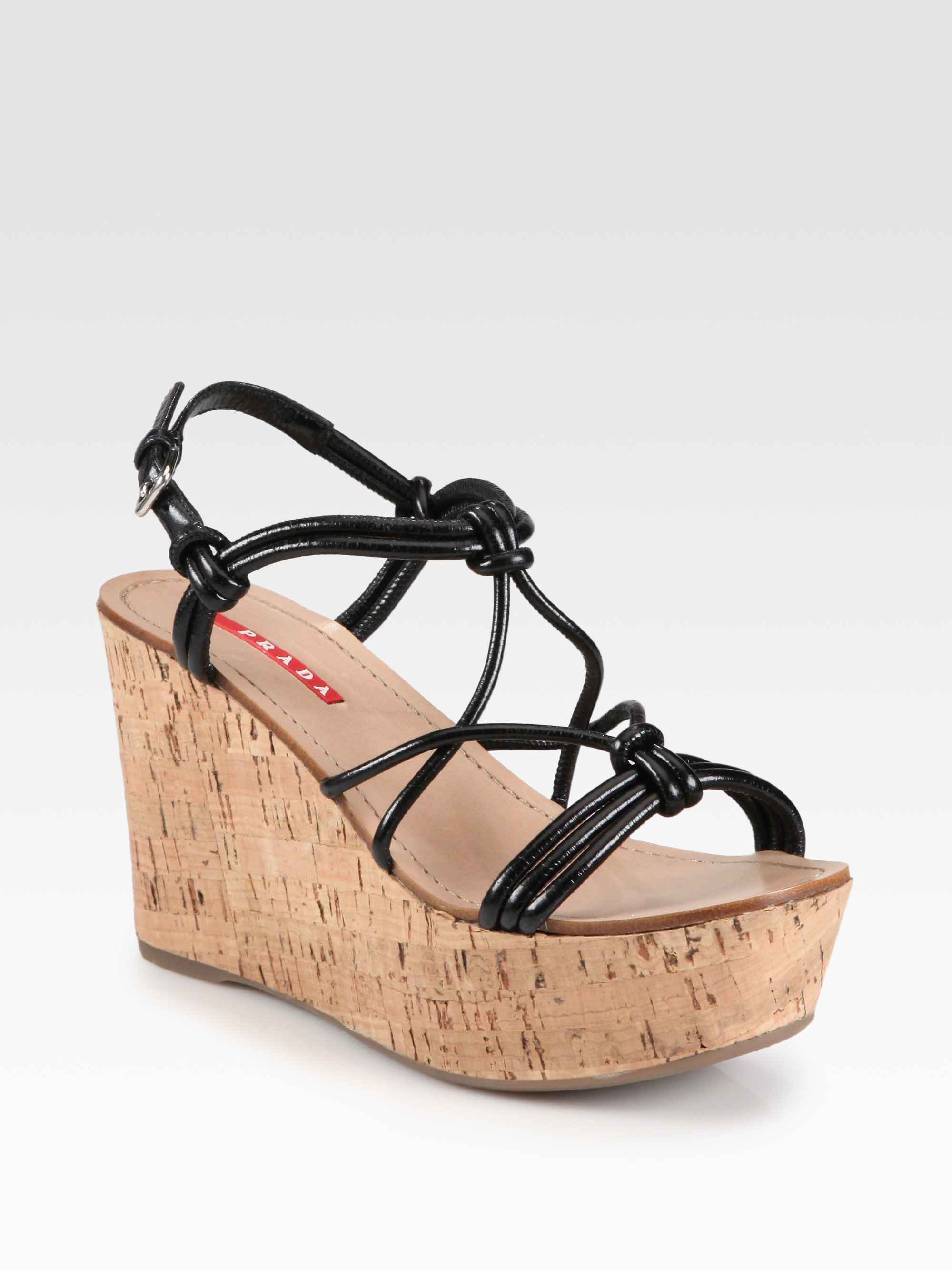 Prada Knotted Leather Cork Wedge Sandals in Black - Lyst