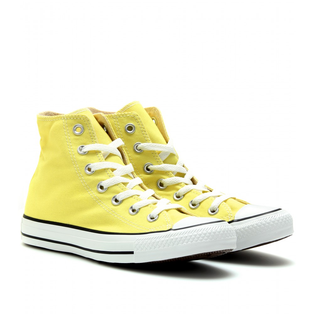 pastel yellow high top converse