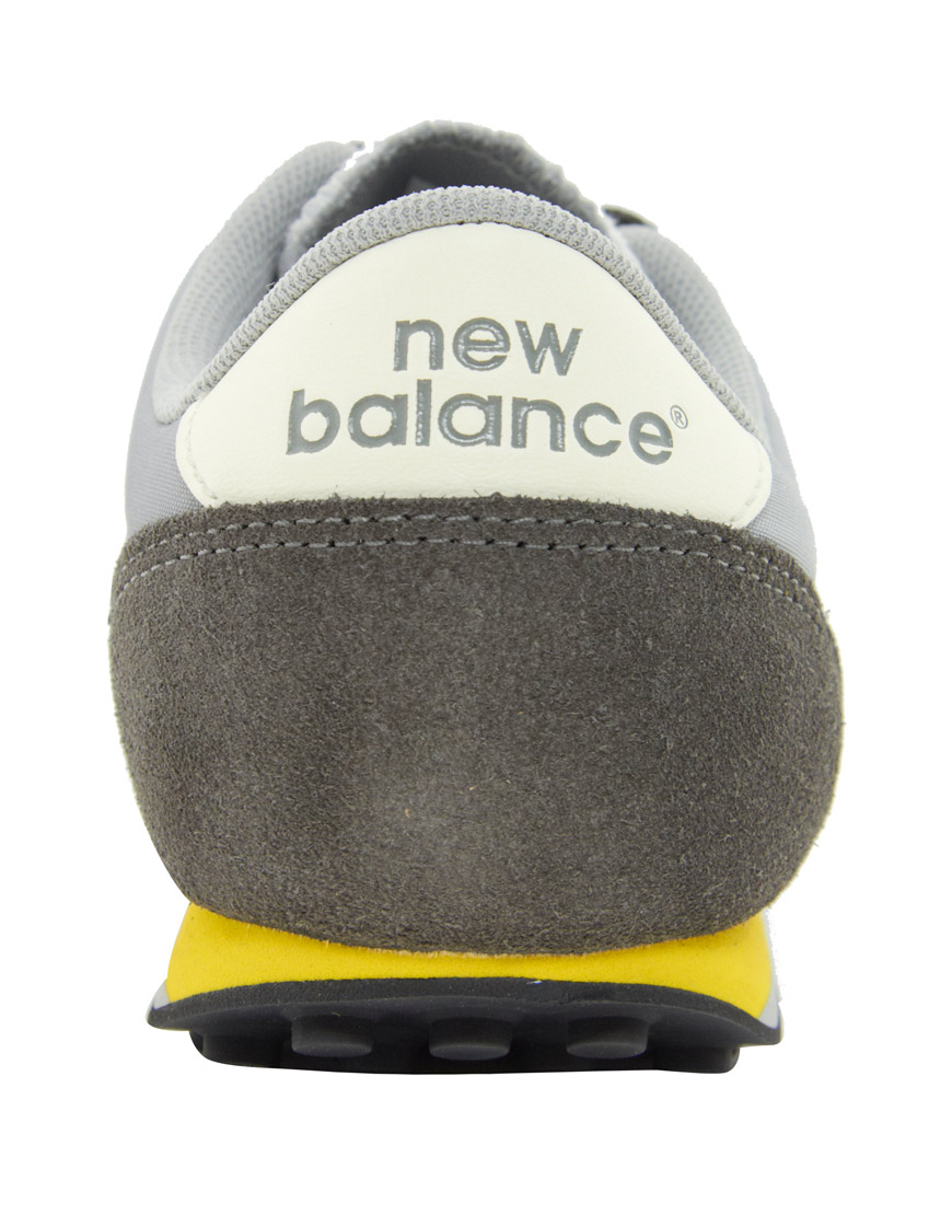 new balance 410 grey yellow
