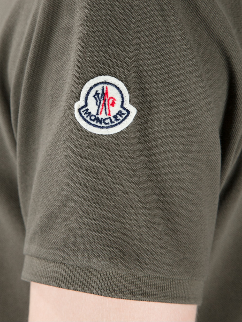 moncler polo badge on arm
