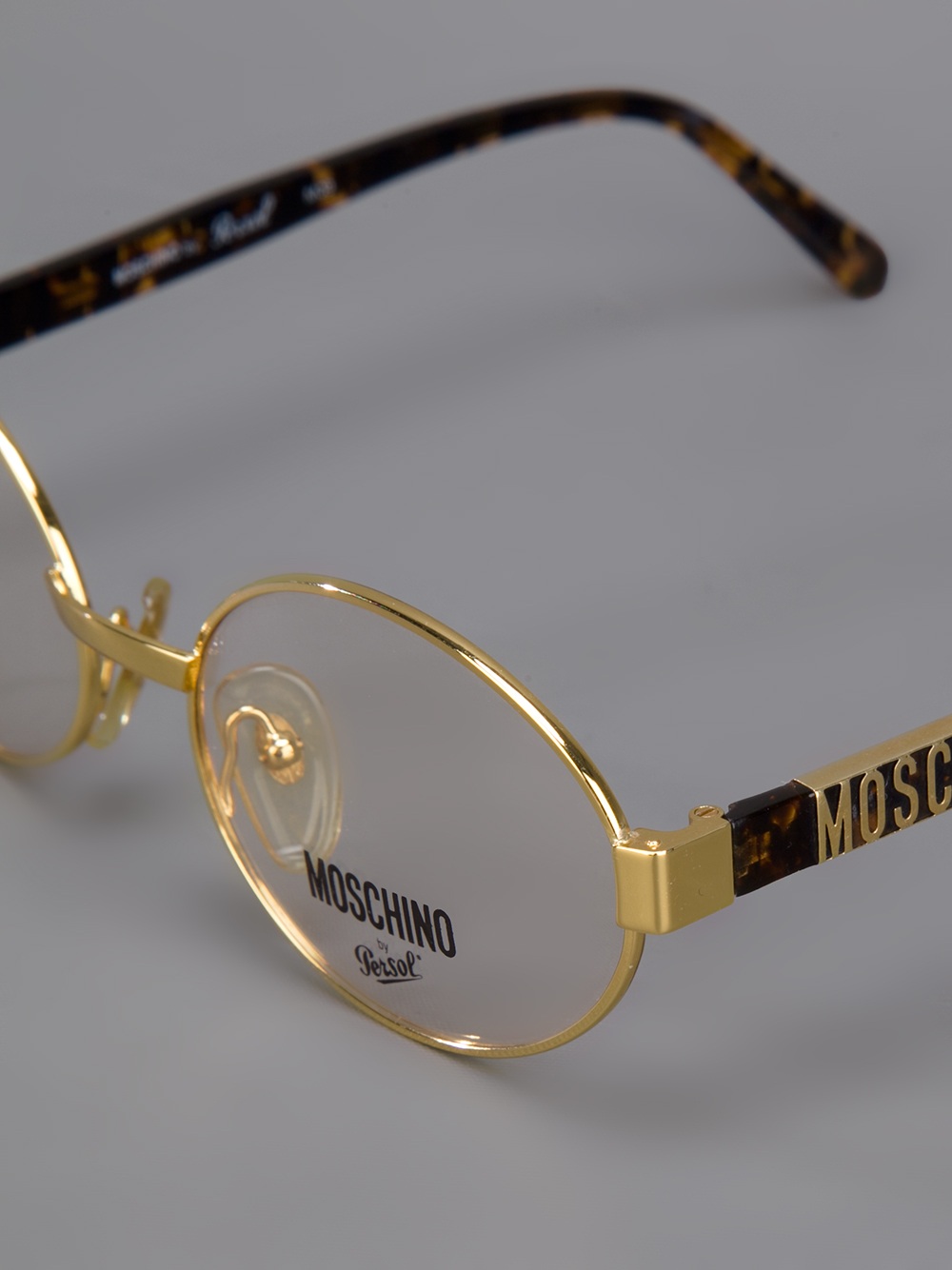 Moschino Round Frame Glasses In Gold Metallic Lyst