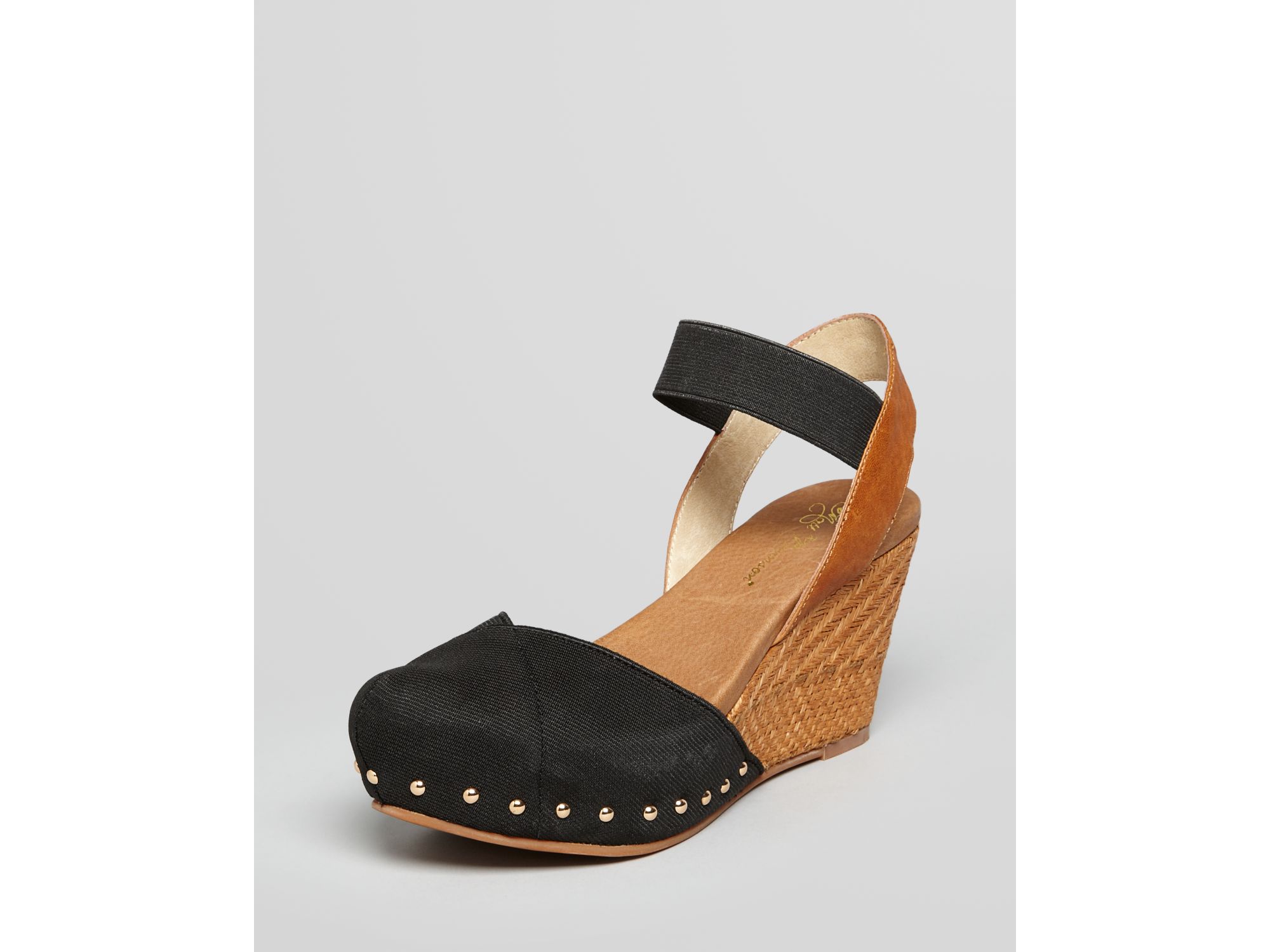 black wedge clogs