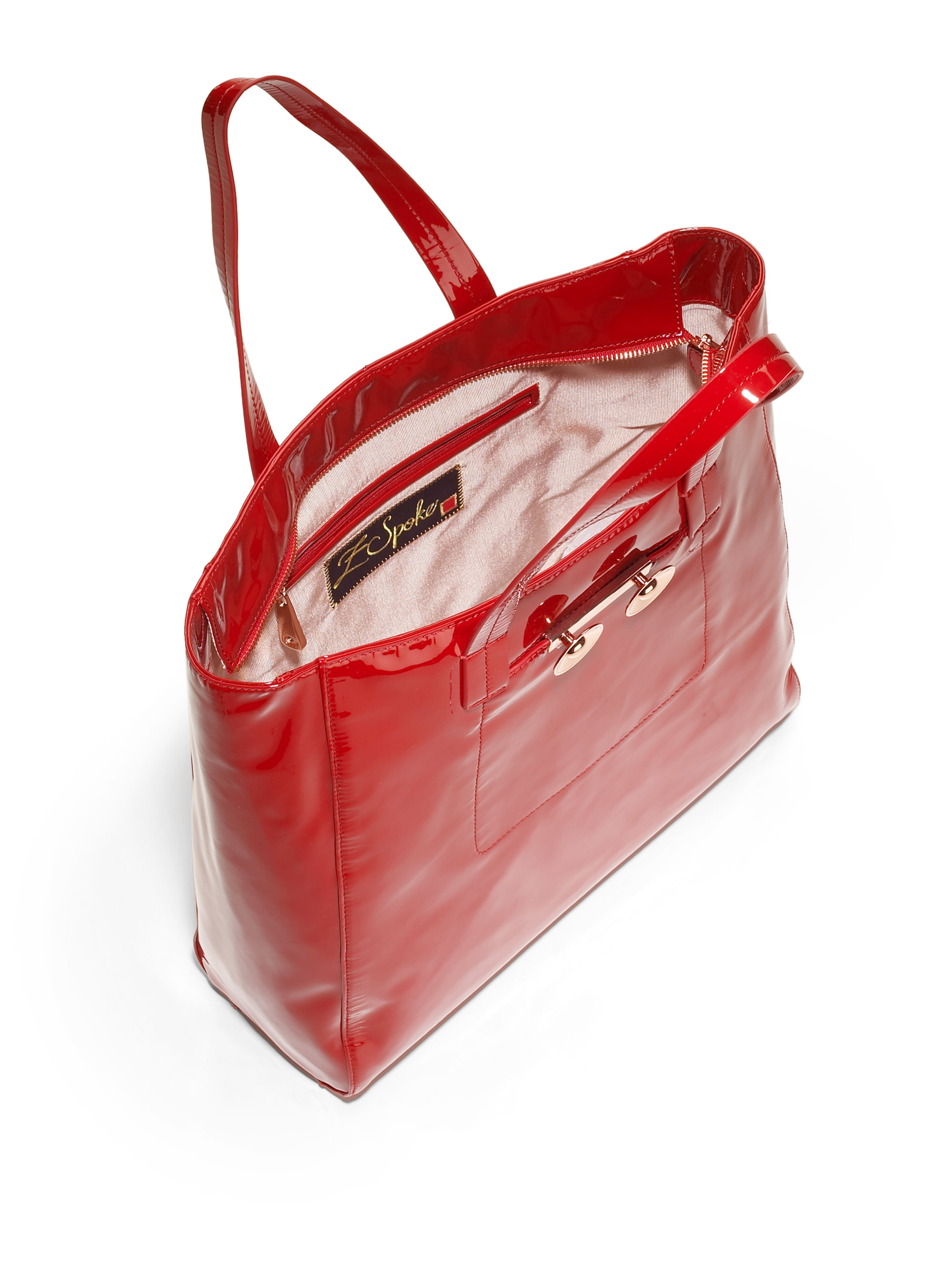 red patent leather tote bag