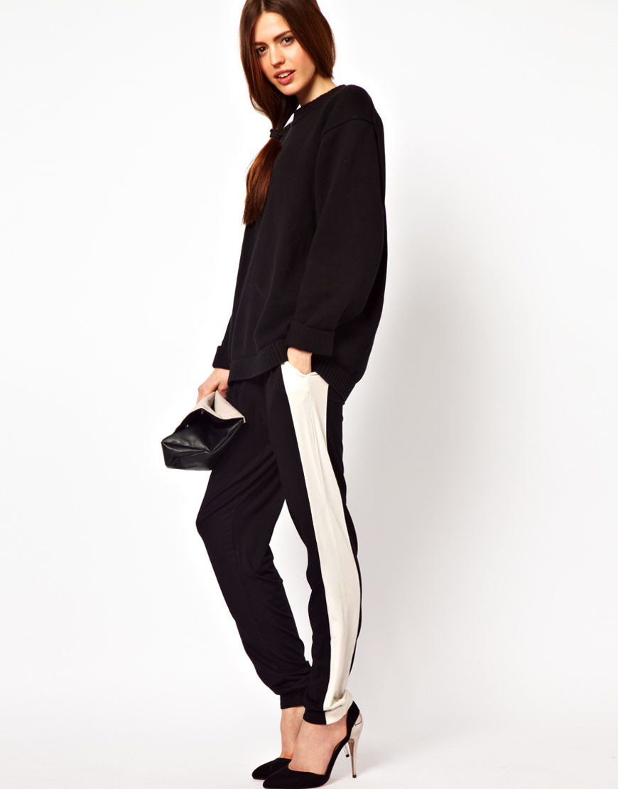 black trousers with red side stripe
