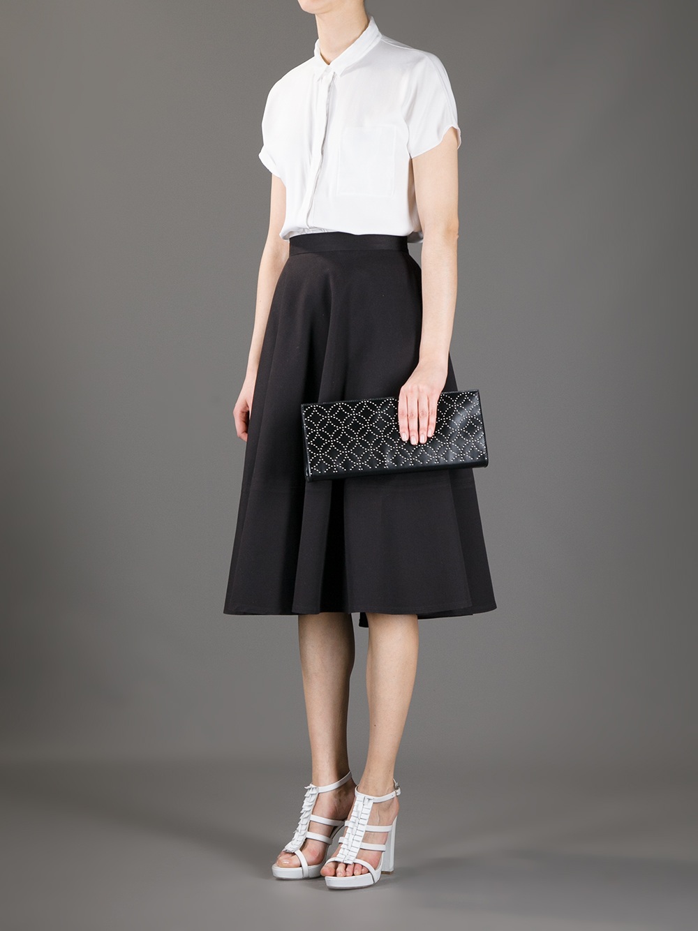 Alaïa Studded Clutch Bag in Black - Lyst