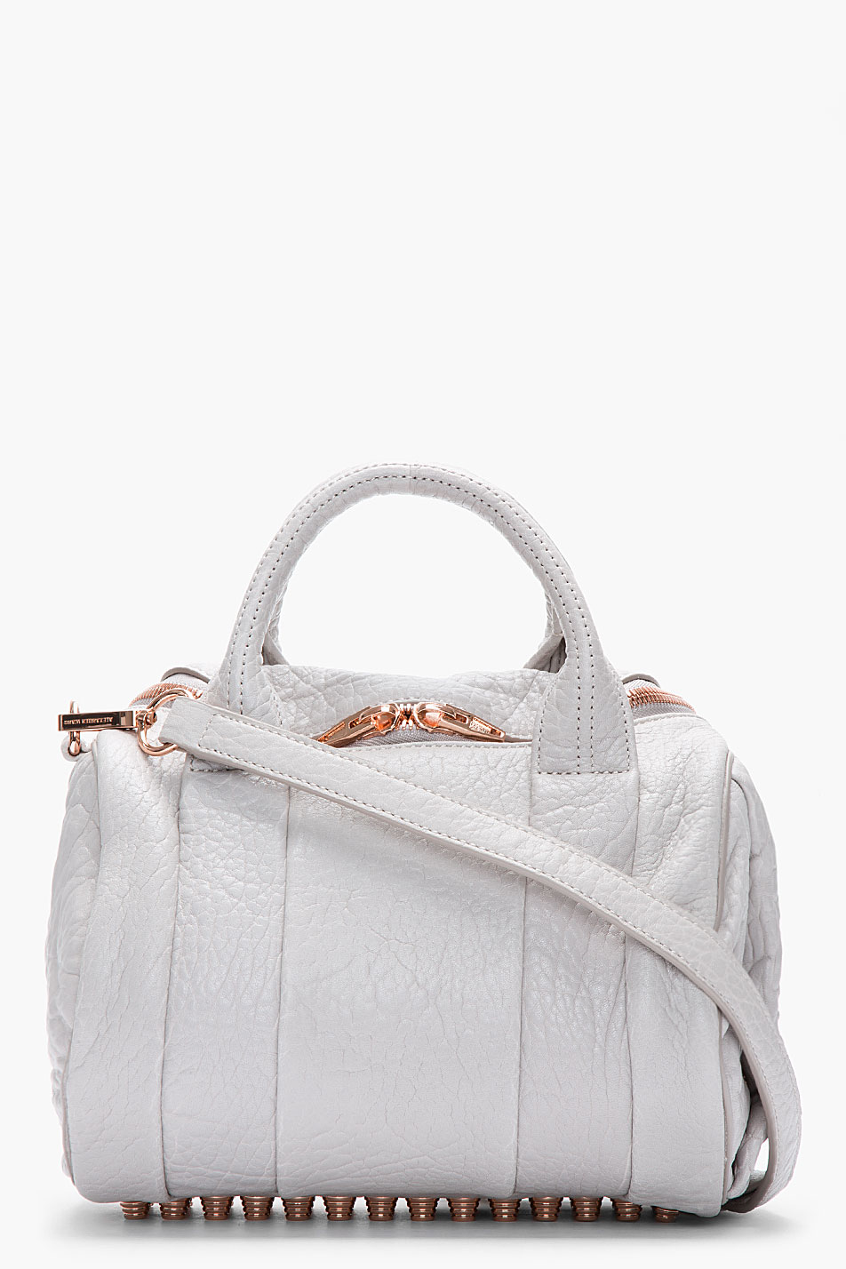 white and rose gold bag