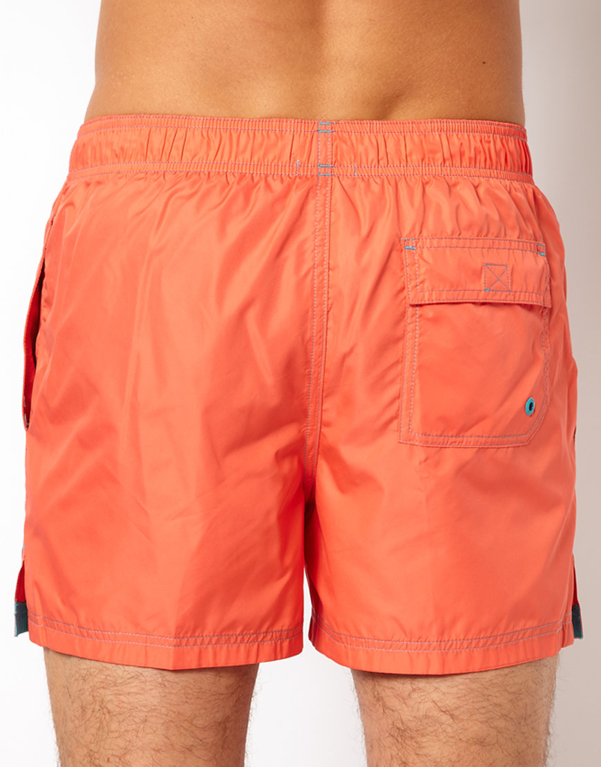 Calvin Klein Placement Logo Swim Shorts in Orange for Men - Lyst