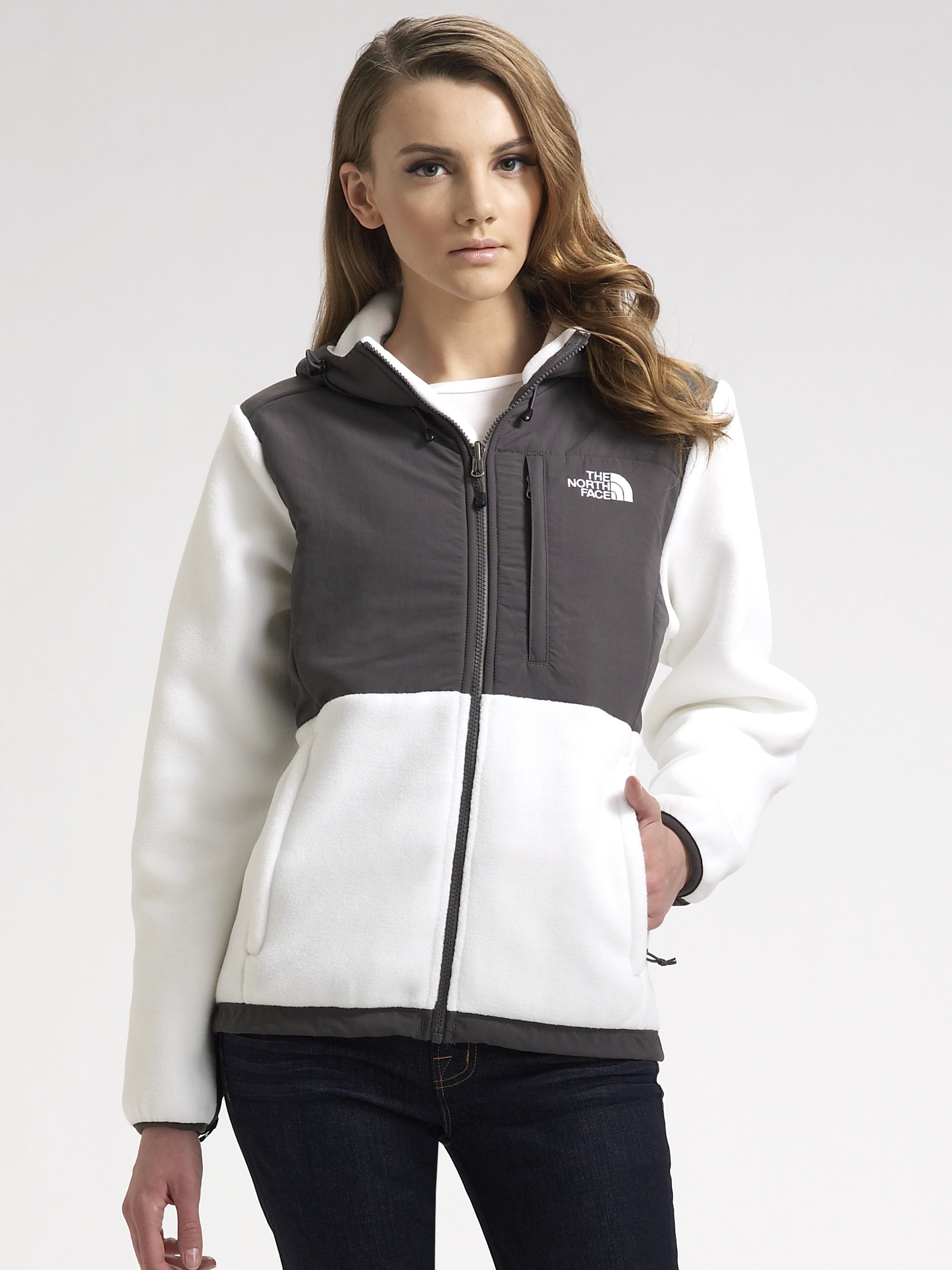 white and grey north face fleece