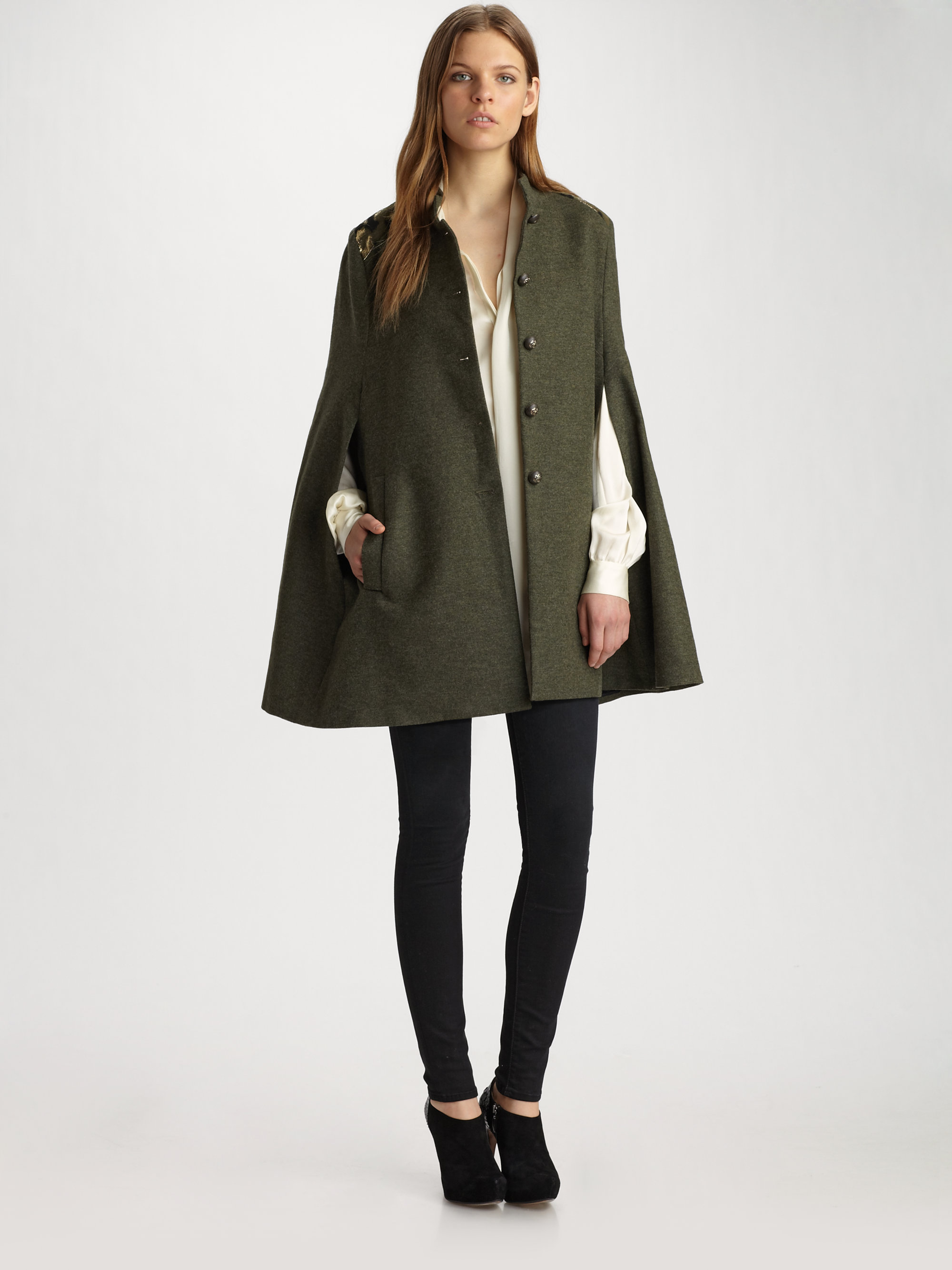 green cape coat