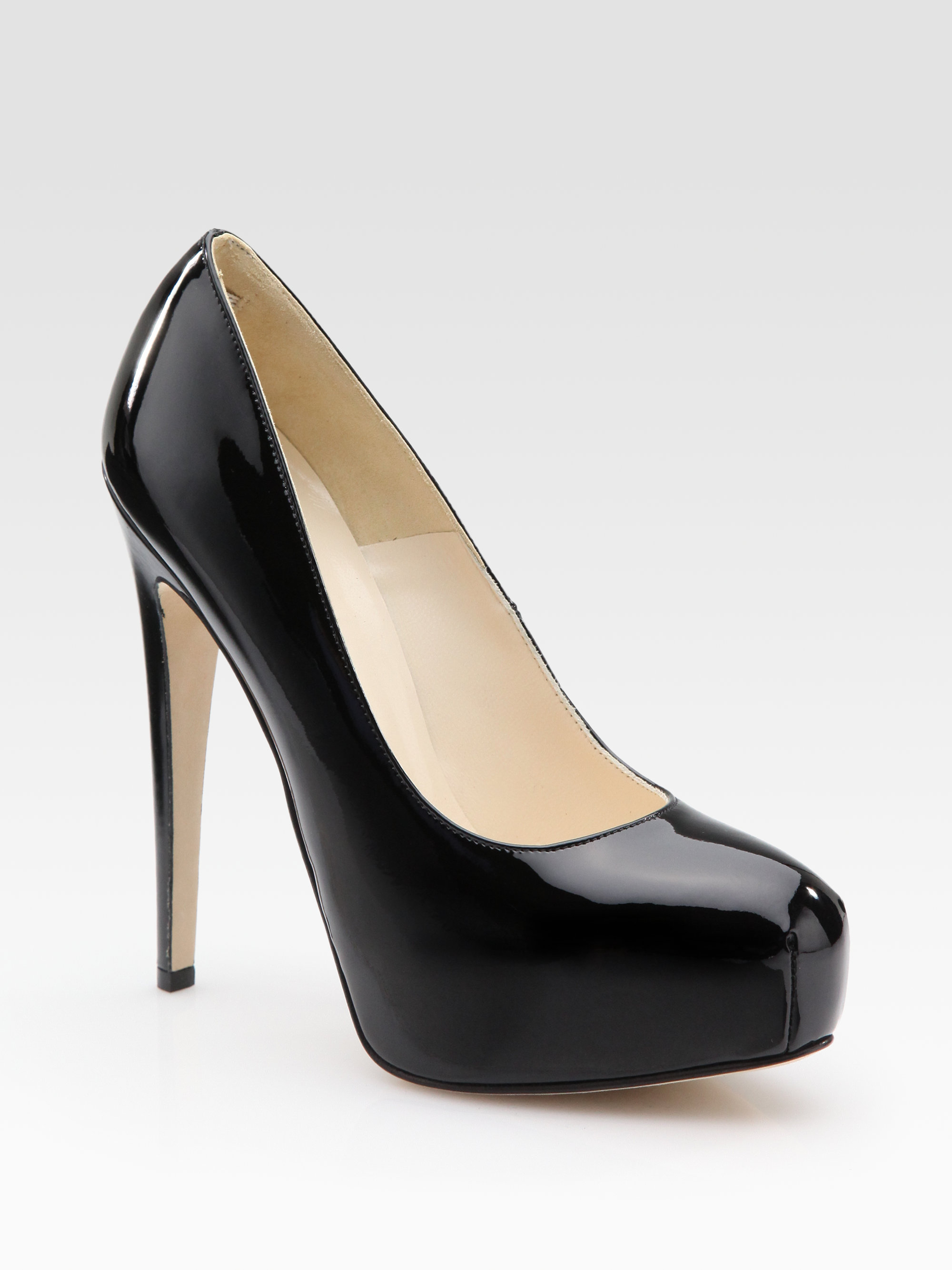 white patent leather platform pumps