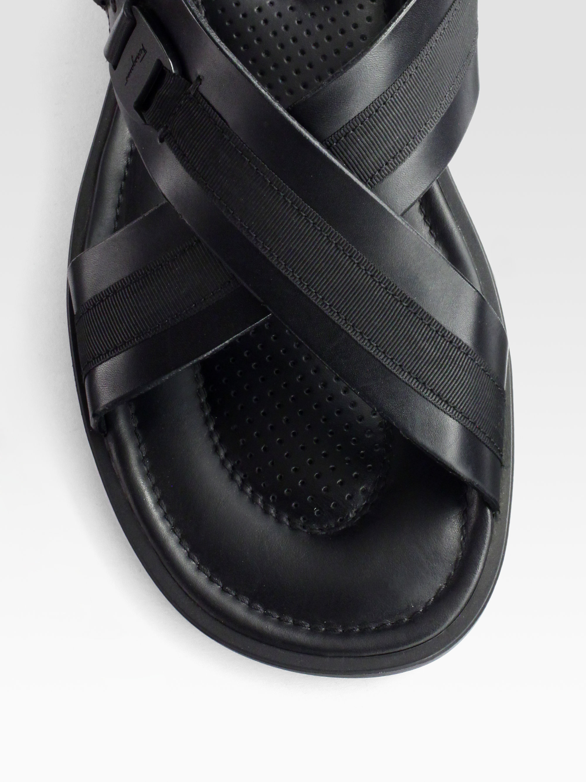 black and gold ferragamo slides