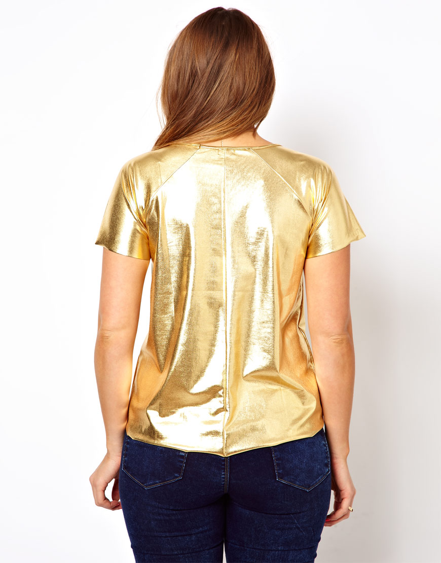 red shirt with gold letters