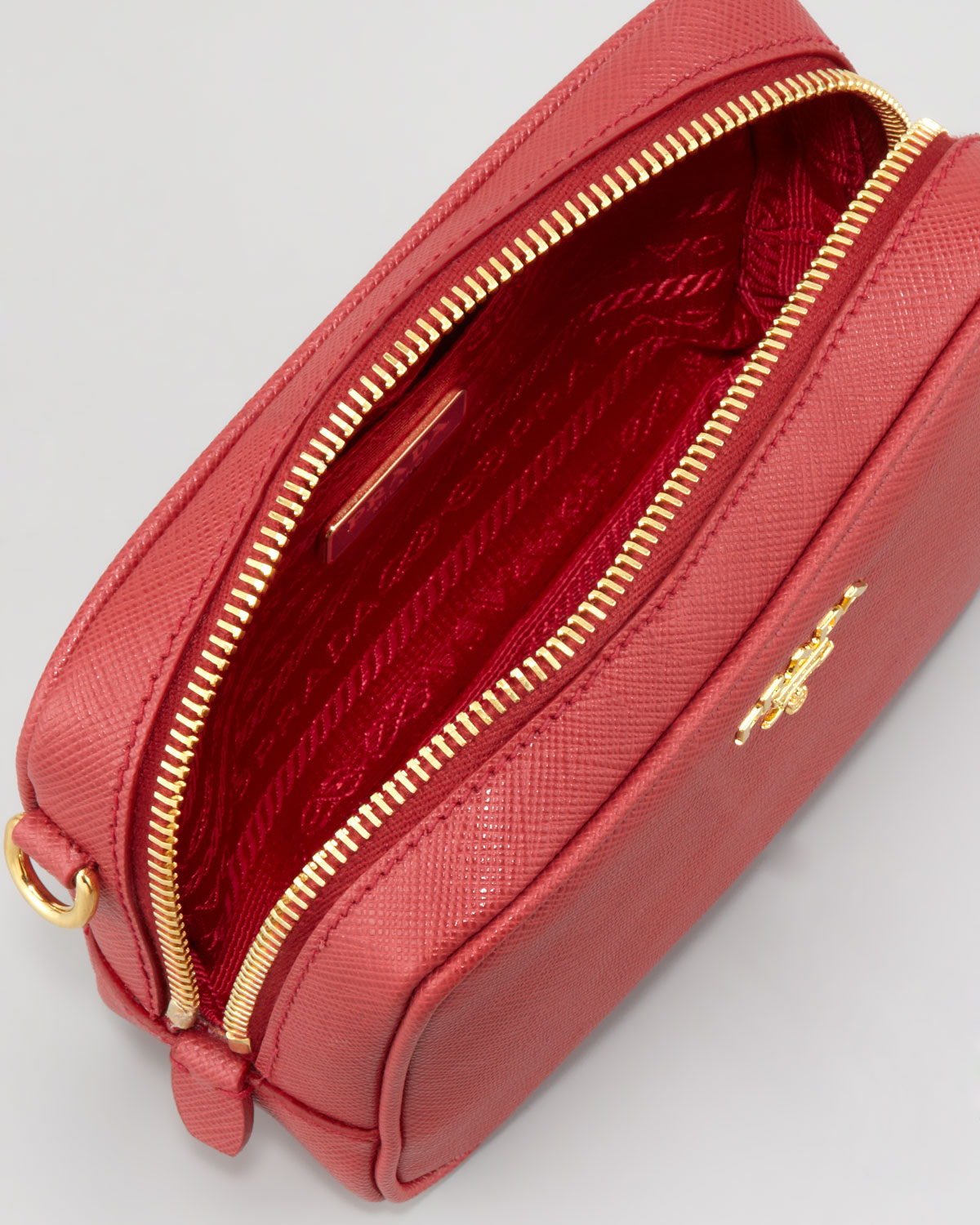 Prada Leather Saffiano Mini Zip Crossbody Bag in Red - Lyst