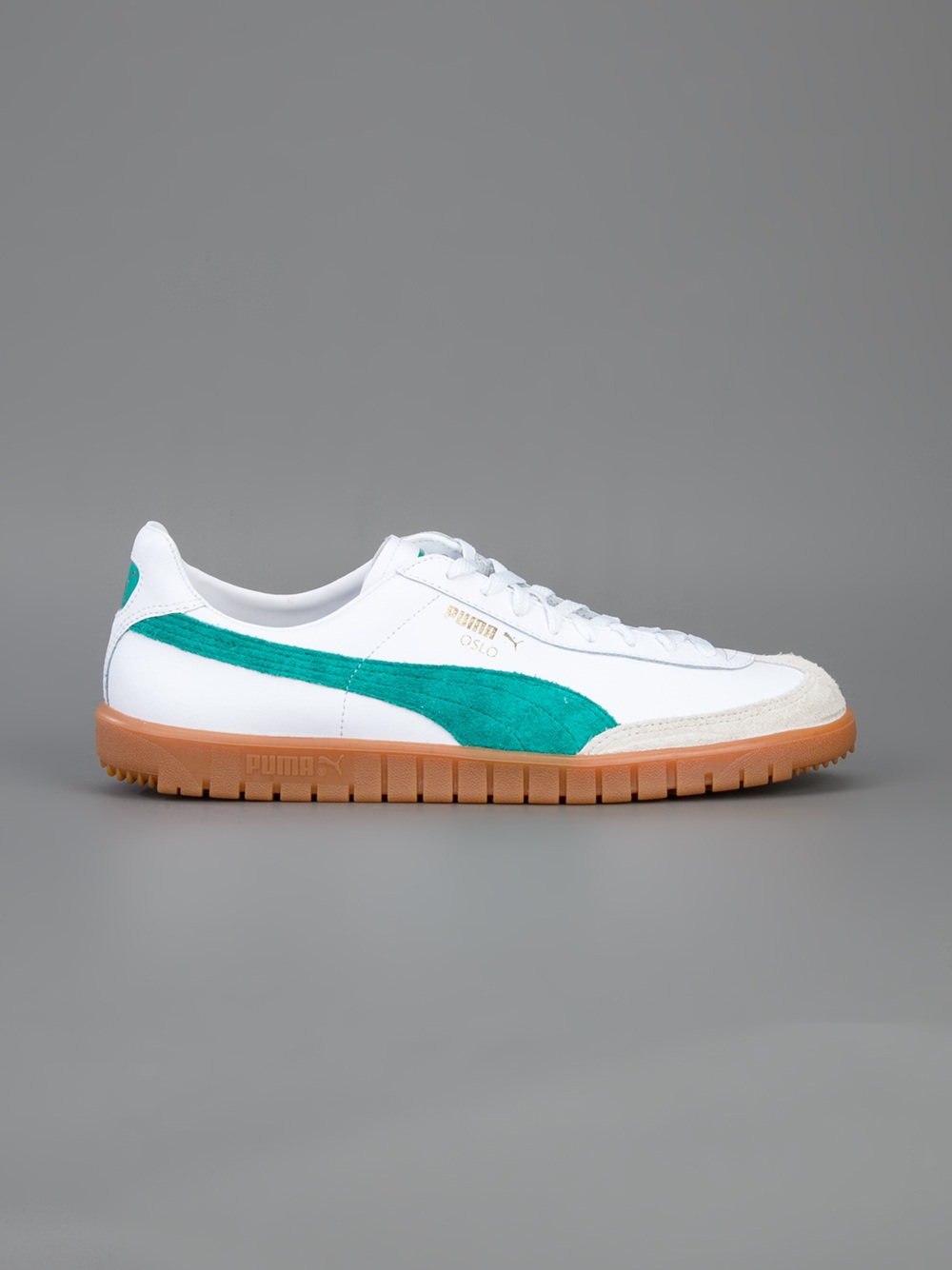 puma oslo pro leather trainer in white and green