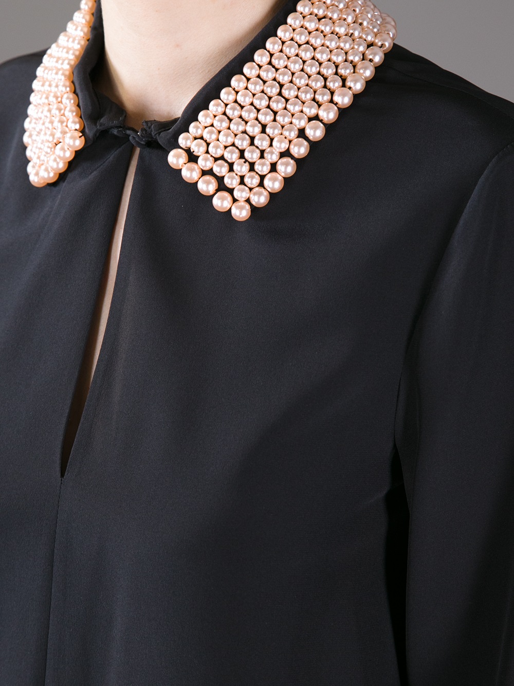 How to embellish a shirt collar with pearls