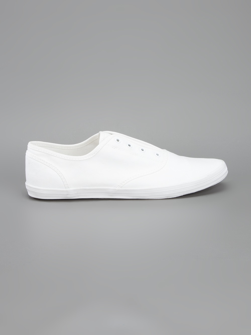 white laceless sneakers