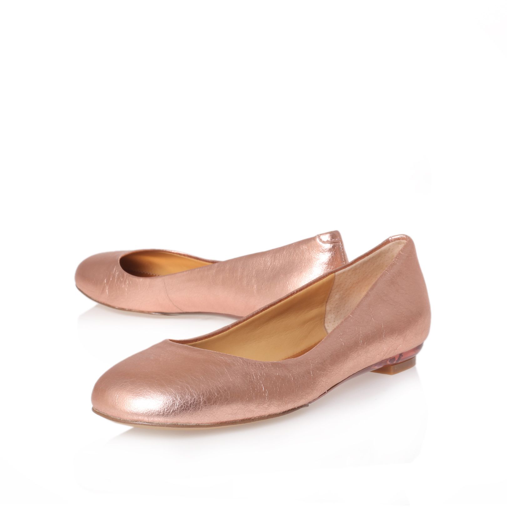 rose gold flat pumps