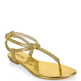 Lyst - Michael Michael Kors Jessie Glitter Flat Thong Sandal in Gold in ...