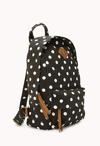 red and white polka dot backpack