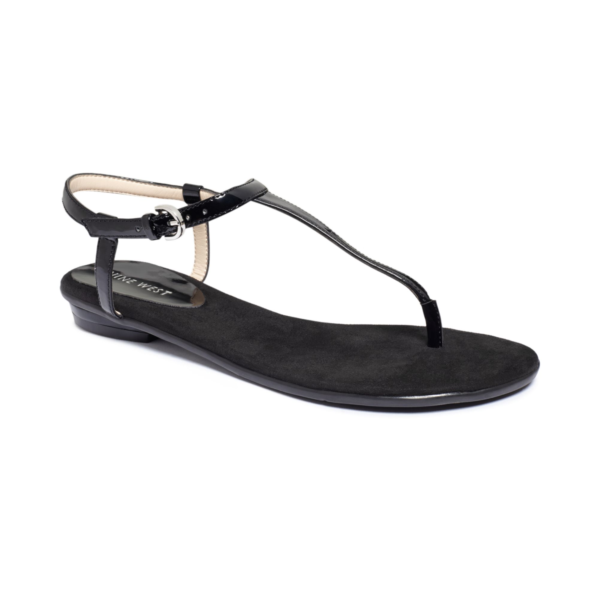 Nine West Izzelly Flat Thong Sandals in Black - Lyst